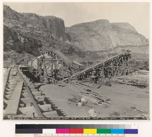 Hetch Hetchy [O'Shaughnessy] Dam construction: Crusher plant and rock and sand storage piles