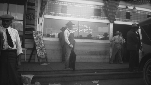 People in front of a casino and buffet cafe, [probably Tijuana, Mexico]