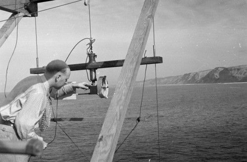 Eugene Cecil LaFond with a current meter aboard R/V Scripps