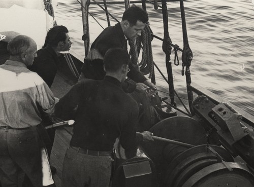 Roger Revelle operating winch onboard R/V E.W. Scripps