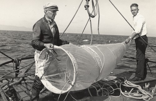 Martin Wiggo Johnson and Earl Myers with plankton net aboard R/V Scripps