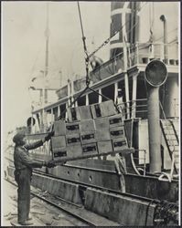 Off-loading crates by winch, The Embarcadero, San Francisco, California, 1920s