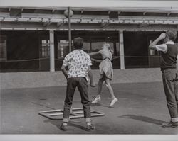 Children play tetherball at McNear School, Petaluma, California, 1960s