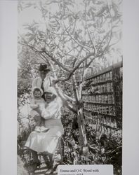 Octavius G. and Emma E. Wood in the garden with an unidentified child, Petaluma, photographed between 1935 and 1940