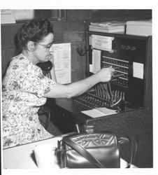 Marie Johnson at a switchboard, Petaluma, California, 1956