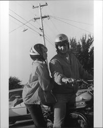 Unidentified people on motorcycles in Petaluma, California, 1973