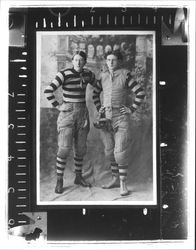 Two men in football gear, Petaluma, California, about 1890