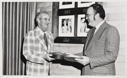 W. L. "Tommy" Thompson accepts film canister at the Sonoma County Fair, Santa Rosa, California, April 9, 1974