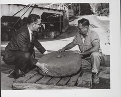 Ed Langhart and Mayor Badger with Cyrus Alexander millstone