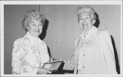 Joan Weetman receives her retirement award from Supervisor Helen Putnam, Santa Rosa, California, 1984