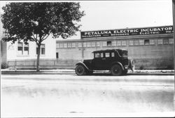 Car parked in front of Petaluma Electric Incubator Company