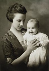 Edith Raymond Cochrane holding her firstborn, Dorothy, Christmas, 1922