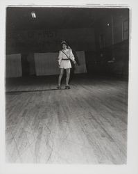 Skater in a tunic in the Skating Revue of 1957, Santa Rosa, California, April, 1957