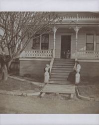 Mollie Gale, friend of the Doyle family with a young girl, 1062 Third Street, Santa Rosa, California, 1903