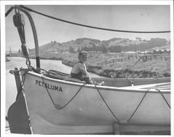 Boy sitting in the boat "Petaluma", Petaluma, California, about 1949