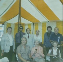 Helen Putnam sipping wine with an unidentified group, Petaluma, California, August, 1981