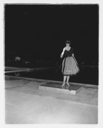 Black and checked dress modeled in the Sword of Hope fashion show at the Flamingo Hotel, Santa Rosa, California, 1960