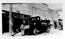 Truck in front of Lampson's Pioneer Garage