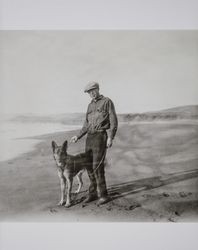 Carroll C. Doane at the shore with his dog, "Jack," Sonoma County, California, 1927
