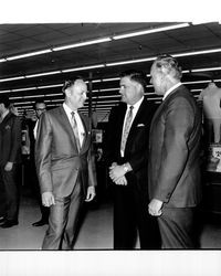 Lawrence S Gaskell, Gerald Poznanovich and an unidentified man eating at K-Mart grand opening, Santa Rosa, California, 1970