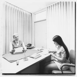 Louise Ederle, administrator, and student in Mrs. Ederle's office at Luther Burbank College of Commerce, Santa Rosa, California, 1971