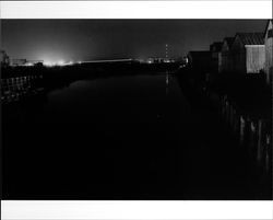 Evening view of the Petaluma River and warehouses south of the D Street Bridge