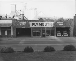 Exterior view of Chet Dickson Plymouth Dodge, Petaluma, California, 1957