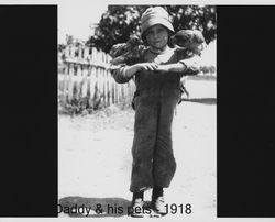 Russell Nissen with his pet chickens, Petaluma, California, about 1918