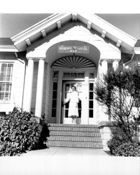 Nurse opening the door of Petaluma General Hospital