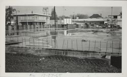 Rain puddles in the main floor foundation of the Sonoma County Library