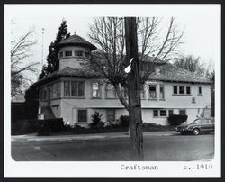 Colonial Revival Style home with roof turret