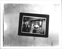 Three men in an unidentified tobacco shop, Petaluma, California, 1897