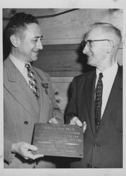 Bud Feliz receiving a plaque in recognition for his work for Hillcrest Hospital, Petaluma, California, 1957