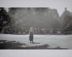 Justena E. Long stands in the Santa Rosa Train Depot parking lot in Santa Rosa, California, 1930s