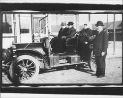 George P. McNear standing beside his automobile, Petaluma, California, about 1910