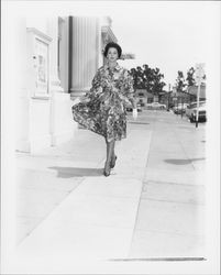 Floral-print belted dress modeled outside the Sonoma County Courthouse in downtown Santa Rosa, California, 1959