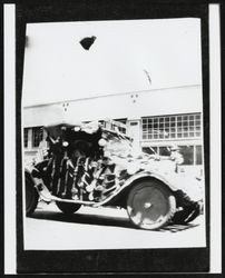 Car decorated for an unidentified parade in downtown Petaluma, California, about 1923