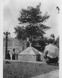 Floats being driven down East Washington Street near the intersection of Copeland Street, Petaluma, California, about 1920