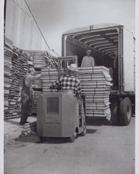 Kresky Coca Cola signs being loaded for shipment