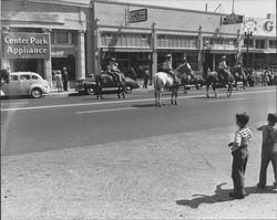 Horses and riders in the Sonoma-Marin Fourth Agricultural District Fair Parade, Petaluma, 1947
