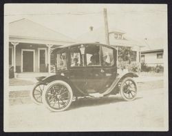 Mrs. Manville Doyle in her first automobile