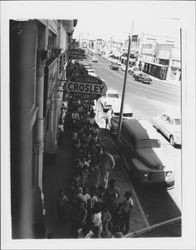 People lined up on Main Street in front of Guy's Furniture Company, Petaluma, California, about 1956