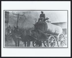 Water wagon wetting down the streets of Guerneville