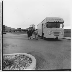 Sonoma County Library Librarian Linda Tucker and a group gathered outside the Bookmobile II at Oakmont, Santa Rosa, California, 1972