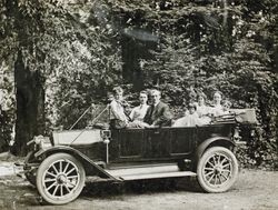 Dr. Wilfred E. Bixby, Sr. and family and friends out for a drive in the redwoods in their 1911 Overland 59 touring car