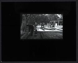 Workers constructing unidentified bridge