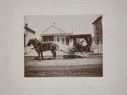 Raymond family in their buggy in front of their Sixth Street house in Petaluma, California, 1900