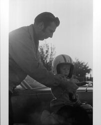 Unidentified people on motorcycles in Petaluma, California, 1973