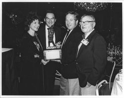 Harriet Lembeck holding the 1983 Perpetual Trophy for Excellence in Wine Writing, 1983