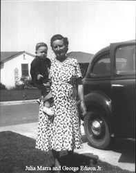 Julia Marra with George Edison, Jr. in front of 420 Fair Street, Petaluma, California about 1950